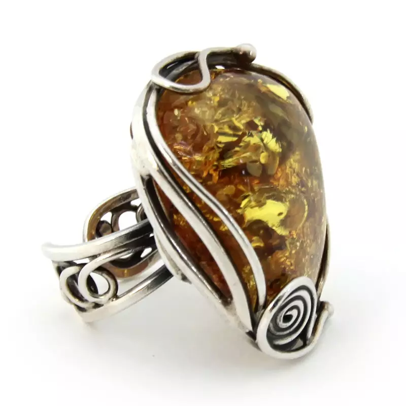 Ring mei amber (60 foto's): yn sulver en yn goud, prachtige solide ring út griene amber en multikoloreare, mei carnelian 3146_22