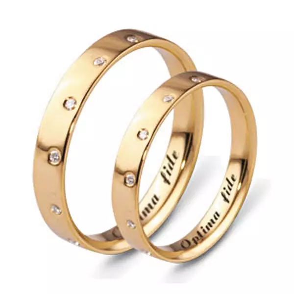 Вјенчани прстенови са камењем (50 фотографија): Да ли је могуће женски венчани прстен са црним камењем у кругу 3167_17