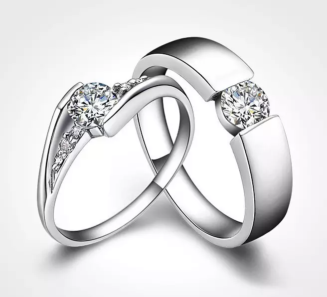 Esküvői gyűrűk kövekkel (50 fotók): Lehetséges, hogy egy női esküvői gyűrű fekete kövekkel egy körben 3167_19