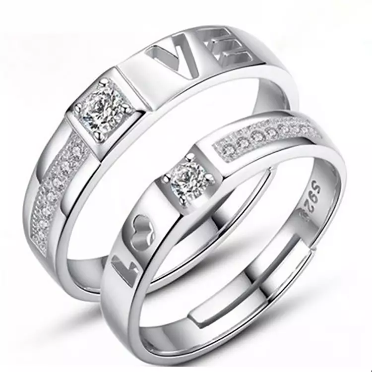 Esküvői gyűrűk kövekkel (50 fotók): Lehetséges, hogy egy női esküvői gyűrű fekete kövekkel egy körben 3167_20