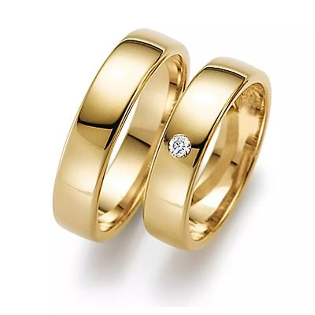 Esküvői gyűrűk kövekkel (50 fotók): Lehetséges, hogy egy női esküvői gyűrű fekete kövekkel egy körben 3167_3
