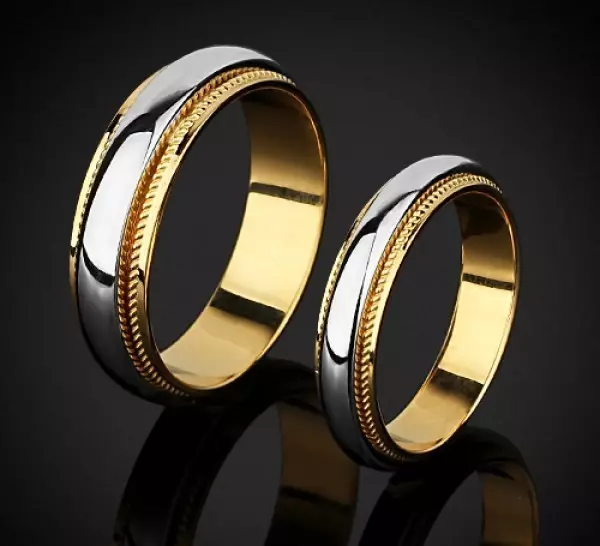 Nhẫn cưới đôi (41 ảnh): Nhẫn cưới của phụ nữ trên một ngón tay và các mô hình khác 3177_21