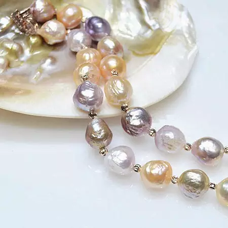 Perlas barrocas (27 fotos): ¿Que é o que é chamado? Forma irregular barroca de perla natural, grandes perlas barrocas irregulares 3246_9