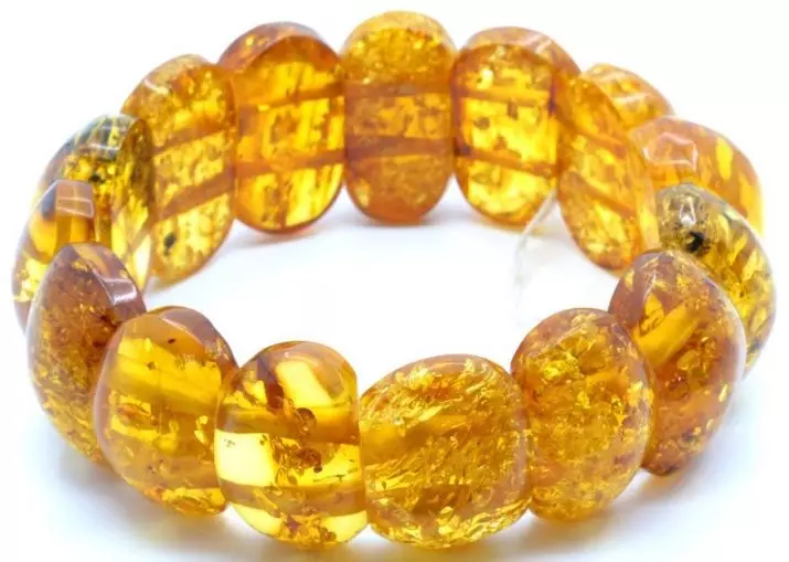 Comment distinguer l'ambre du faux? La différence entre la pierre naturelle de l'artificiel. Comment vérifier l'authenticité à la maison? 3269_17