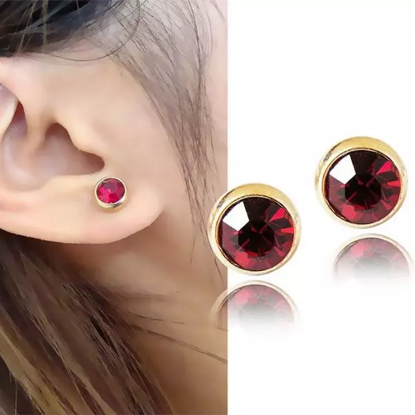 Anting-anting dengan Ruby (66 foto): anting-anting emas dan perak, model perak yang bergaya seperti maskot 3337_14