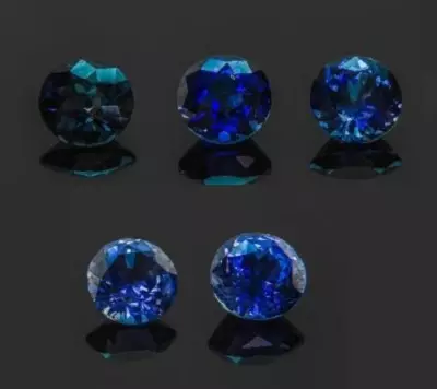 Sapphires Colored (21 ຮູບ): ສີບົວແລະສີຂຽວ, ສີສົ້ມແລະສີມ່ວງ, ແນວພັນສີມ່ວງ, ສີດໍາ, ສີດໍາແລະສີດໍາ, ມີສີສັນສົດໃສແລະປ່ຽນສີ 3436_20