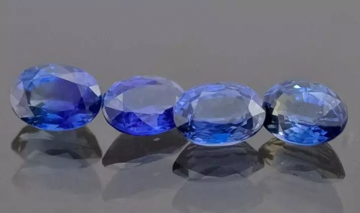 Sapphires Colored (21 ຮູບ): ສີບົວແລະສີຂຽວ, ສີສົ້ມແລະສີມ່ວງ, ແນວພັນສີມ່ວງ, ສີດໍາ, ສີດໍາແລະສີດໍາ, ມີສີສັນສົດໃສແລະປ່ຽນສີ 3436_3