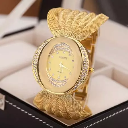 Zelta pulkstenis (104 fotogrāfijas): sieviešu modeļi no Nika, ar zelta aproci un ar dimantiem no jūras un Rolex, cik daudz viņi maksā 3536_23