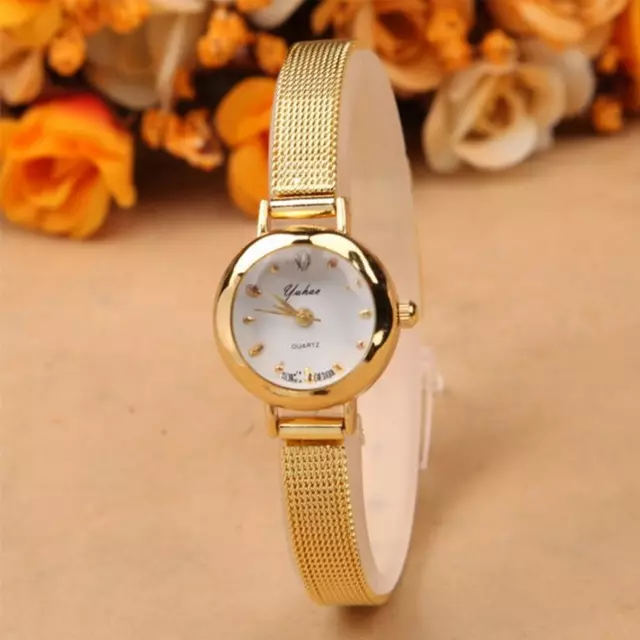 Goldene Uhr mit einem goldenen Armband (77 Fotos): Frauengoldmuster 3559_28