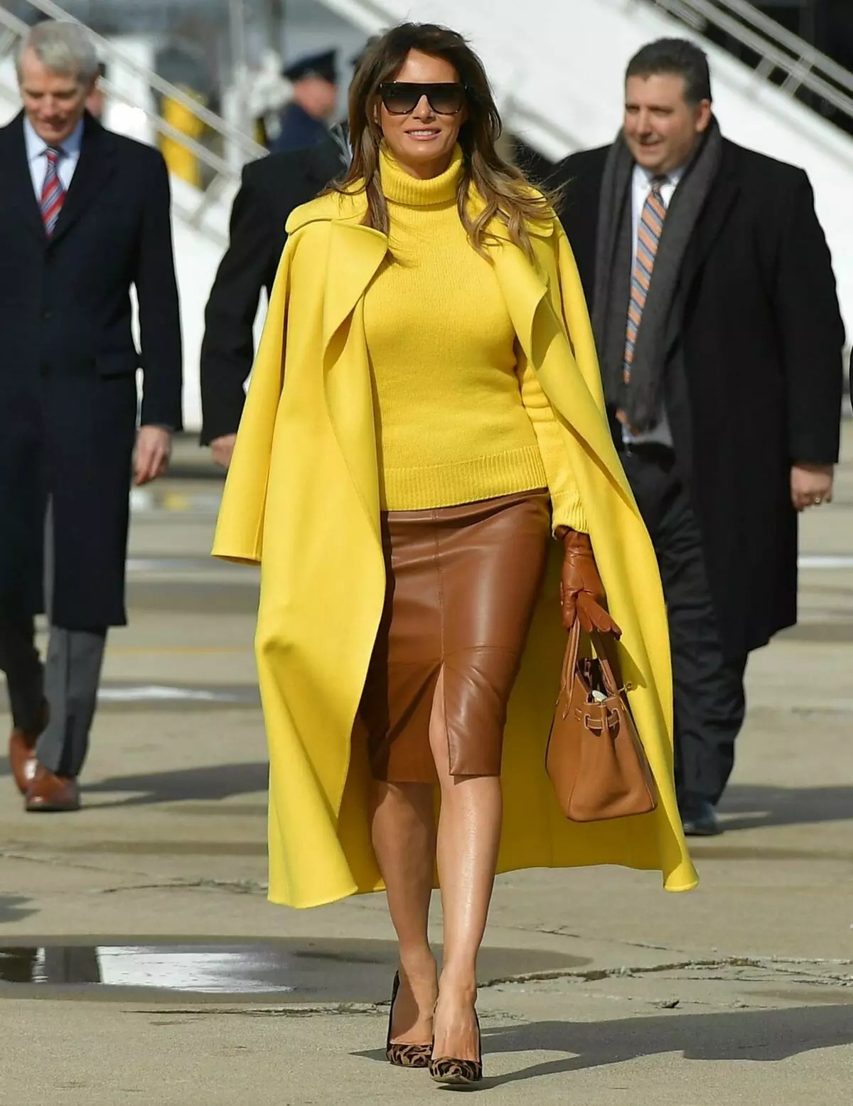 Melania ቅጥ መለከት (50 ፎቶዎች): ዩናይትድ ስቴትስ ለመጀመሪያ እመቤት ልብስ, ምርጥ ምስሎችን እና አልባሳት ነው 3613_13