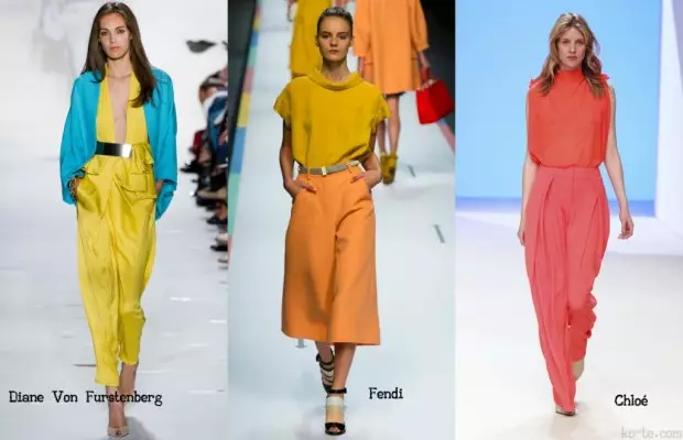 Bloque de cores en roupa (55 fotos): Recibir o bloqueo de cor e todo sobre o estilo de bloque de cores no exemplo de blusas, bolsas, abrigo e outras cousas 3661_11