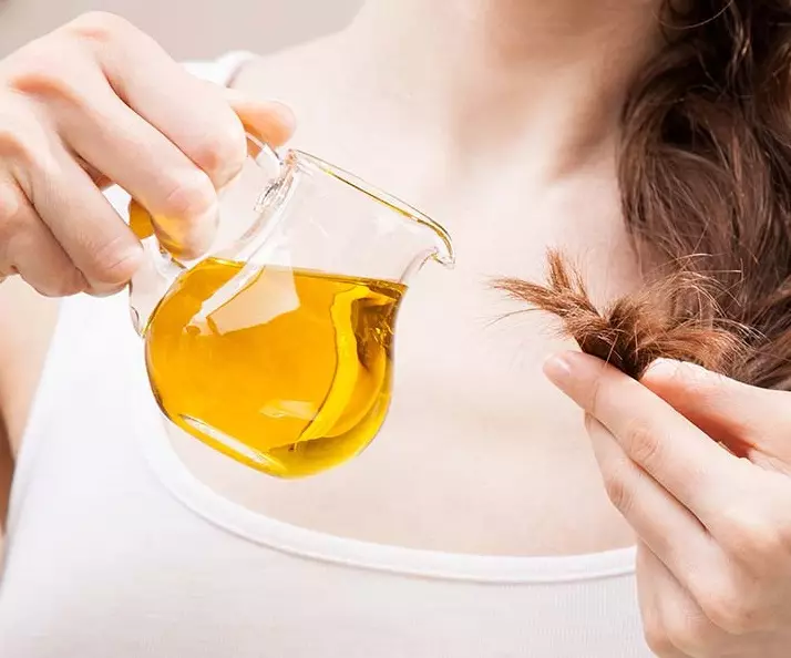 възстановяване на косата масло: Какво е по-добро възстановяване инструмент за повредени къдрици? Отзиви 4817_14