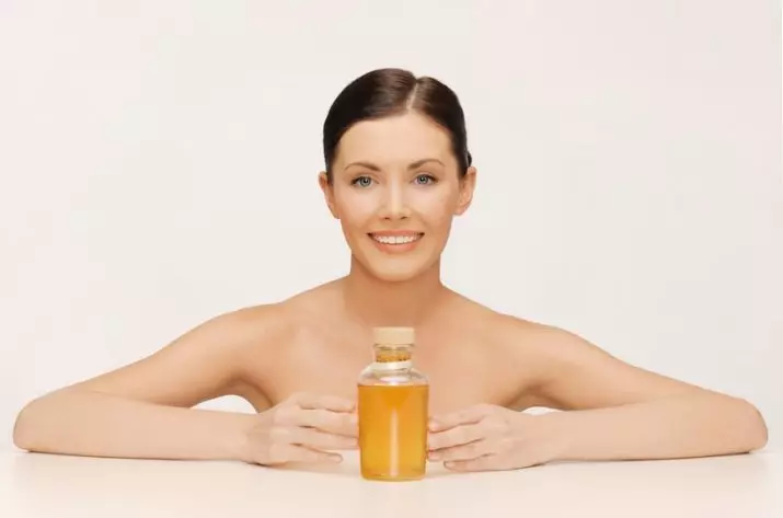 Gesig Jojoba Olie: Eienskappe van die produk in suiwer vorm, die gebruik van plooie op die vel en resensies van kosmetoloë 4875_11