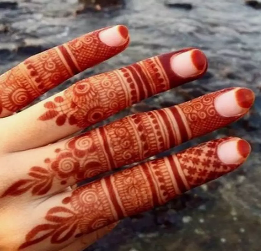 Henna don kusoshi: fasali na manicure da launuka na henna. Yadda za a zana kusoshi? Farin henna don cin hanci da baki, nahi mai shafi sauran heno 5072_2