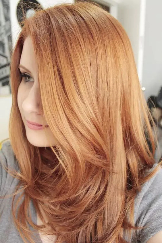 Redhead juuksed (96 fotot): punase värviga toonide palett, pikad ja lühikesed juuksed värvid, külma oranž, kuldsed punased ja muud värvi valikud 5335_43