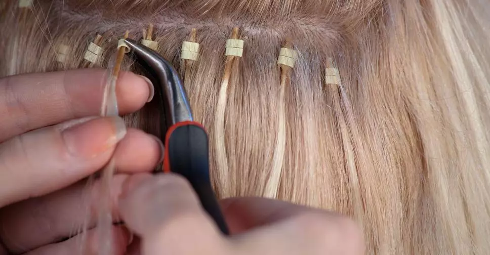Hair extensions voor volume (21 foto's): kenmerken van volumetrische haarverlenging voor dikte zonder lengte. Is het mogelijk om kort en gemiddeld haar te bouwen? 5522_10