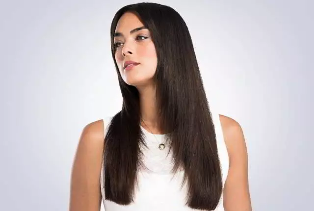 Haircut Lestenka untuk rambut panjang (52 gambar): Gaya rambut wanita pada rambut yang sangat panjang, tangga di seluruh kepalanya di rambut lurus dan bergelombang, pandangan belakang dan depan 5884_13