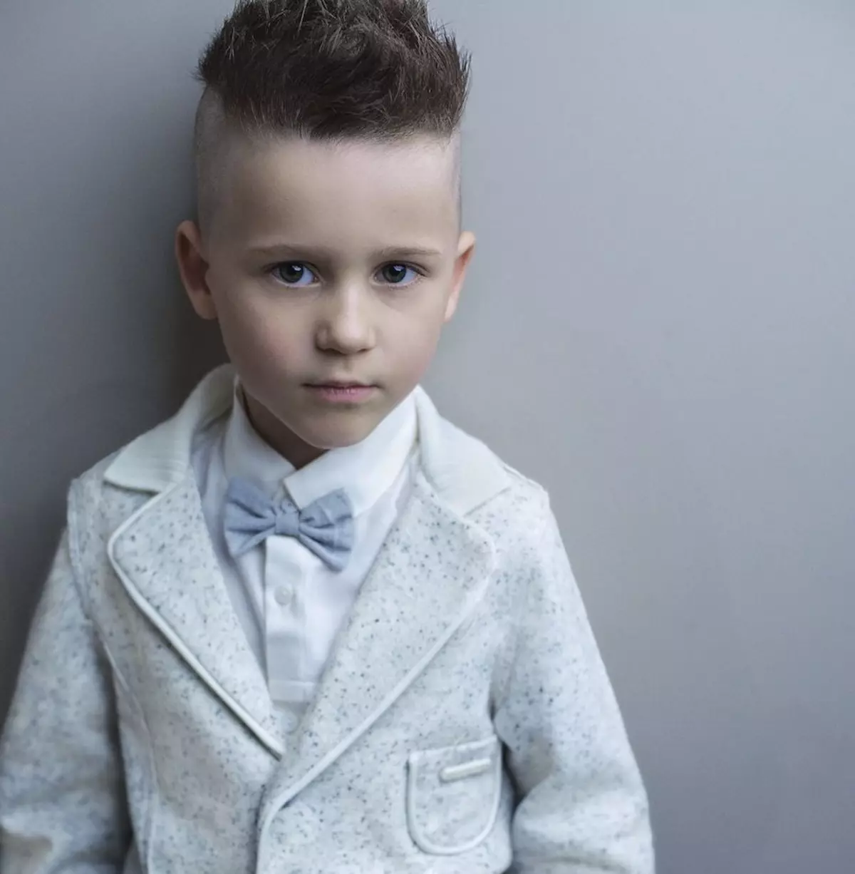 Haircuts Half-Fox para os nenos (39 fotos): Peiteados para adolescentes, cortes de pelo para bebés por 5 e 10 anos 6005_7