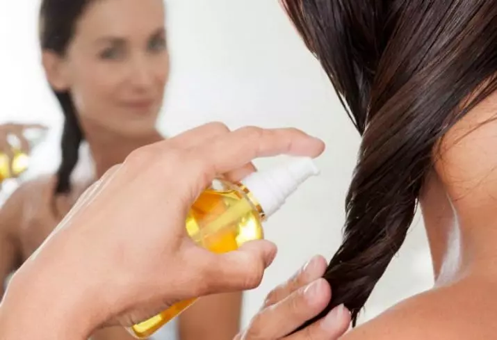 Mbrojtja termike e flokëve nga hekurosja: mjetet më të mira për të mbrojtur kur straightening flokët në shtëpi. Shqyrtime 6159_18