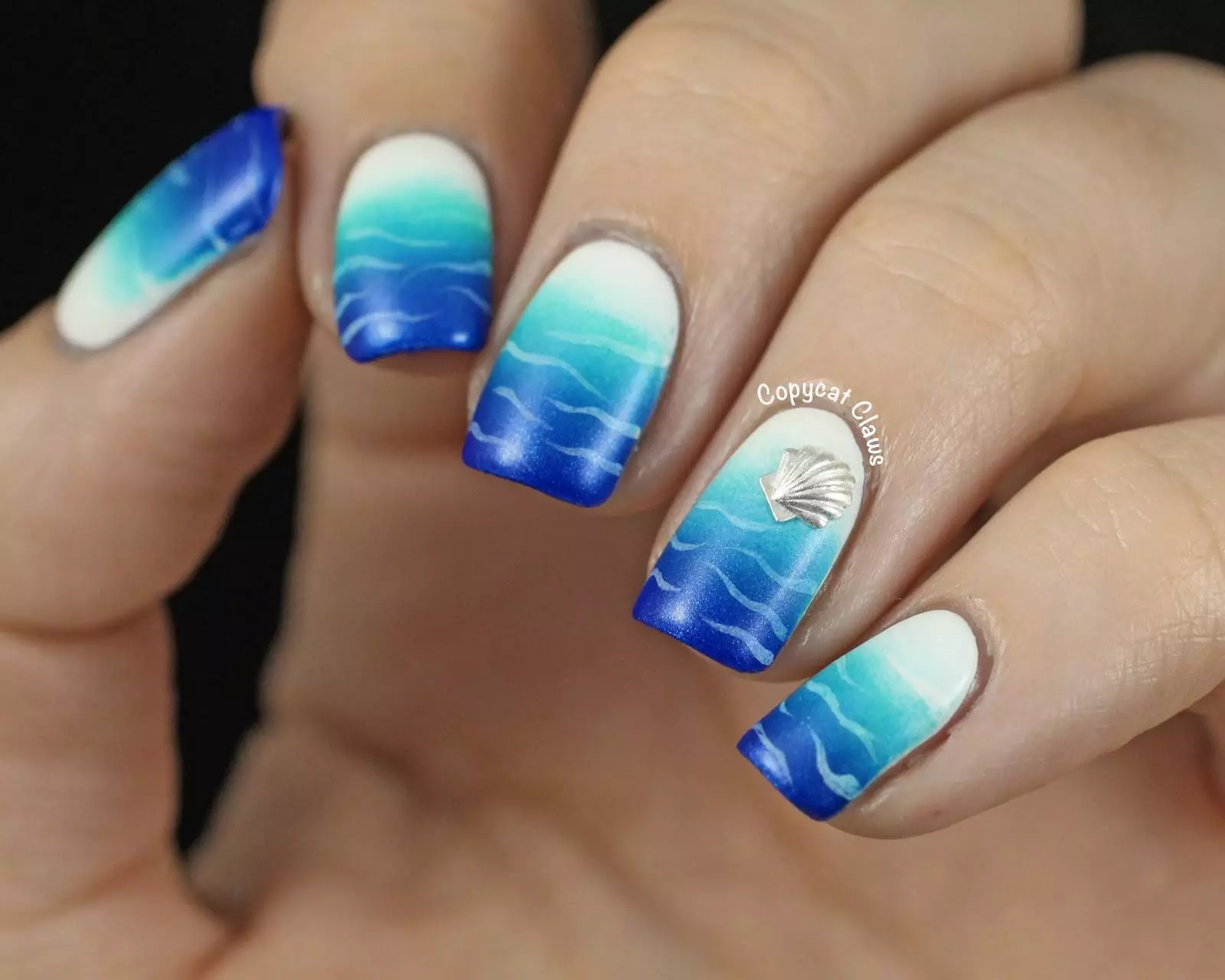Маникир на море (79 фотографии): Кој е дизајнот на ноктите за да се направи на одмор? Идеи за светла и убава летна нокти за патување до одмор 6431_52