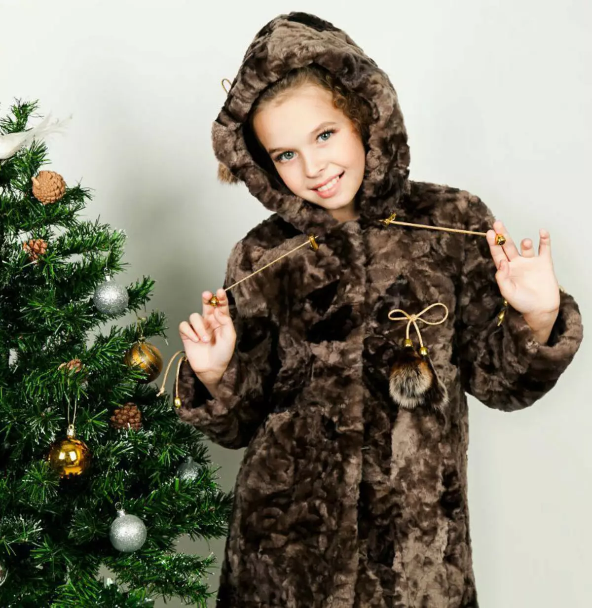 Pelsjakke for en jente (101 bilder): Barnas pelsjakker for en tenåringspike 12 år gammel, pelsjakke på jenter 1-3 år, 4-7 og 8-10 år 719_26