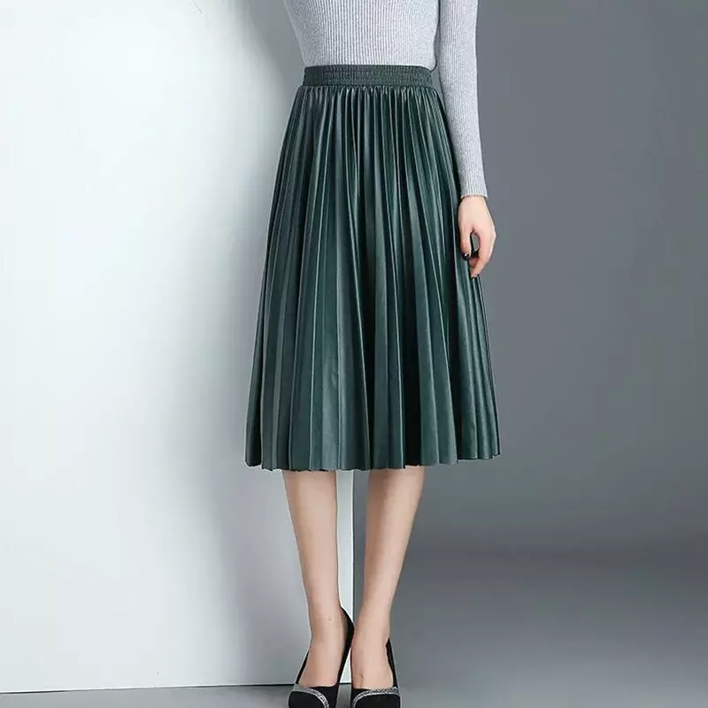 段ボールスカート（79枚の写真）：秋に段ボールスカートを着用する方法、そしてそれらはプリステとどのように異なりますか？長いスカートと膝の下の画像 802_15