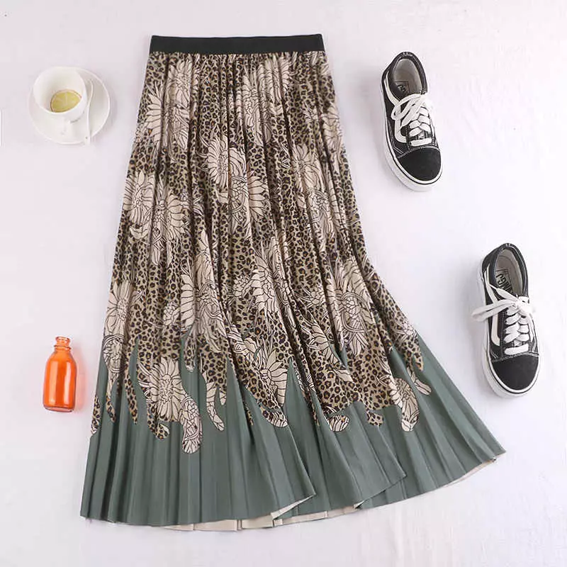 段ボールスカート（79枚の写真）：秋に段ボールスカートを着用する方法、そしてそれらはプリステとどのように異なりますか？長いスカートと膝の下の画像 802_44