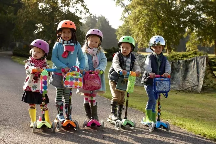 Scooters pour enfants (55 photos): Comment choisir un scooter pour les enfants? Comment apprendre à un enfant à rouler? Note des meilleurs modèles avec de grandes roues et stylo pour les parents. Quel âge pouvez-vous monter? 8730_46