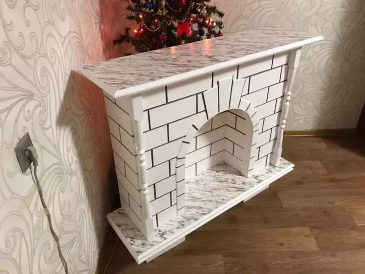 How to decorate a fireplace? Registration with your own hands of decorative fireplaces from boxes and others. Decor with christmas decorations from fir branches and other ideas 8902_71