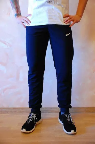 Nike Espò pantalon (79 foto): Fanm yo ak pantalon gason an Nike Modèl 915_15