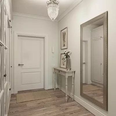 Белата влезна сала (76 фотографии): избор на мебел во коридорот во бело. Дизајн на ходникот во црно-бели и други комбинации во станот 9264_36
