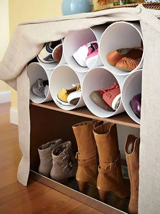 Oppbevaring av sko i gangen (27 bilder): Lagringssystemalternativer. Hvordan lagre sko i en liten korridor? 9314_7
