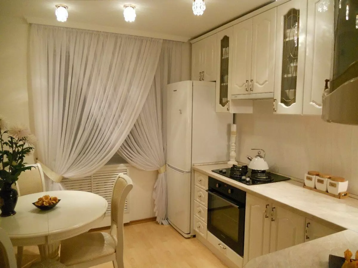 Уютна кухня (79 снимки): Как да създадем комфорт в кухнята в апартамента? Красиви дизайнерски идеи за леки кухни. Как да го оборудваме? 9370_19