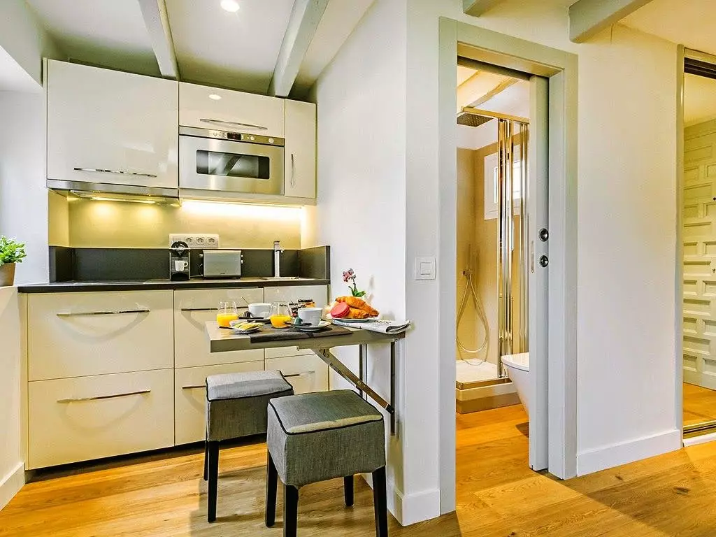 Bucătărie-nișă (42 de fotografii): Ce este? Idei de design interior. Cum să bateți o nișă de bucătărie în apartament? Dimensiunea minimă pătrată 9483_5