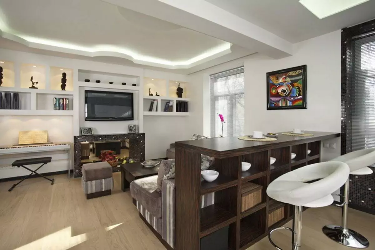 Design kitchen soggiorno 20 metri quadrati. M (75 foto): esempi di progetti con zonizzazione, opzioni interne, sfumature Pianificazione di un soggiorno combinato di cucina con un divano 9508_32