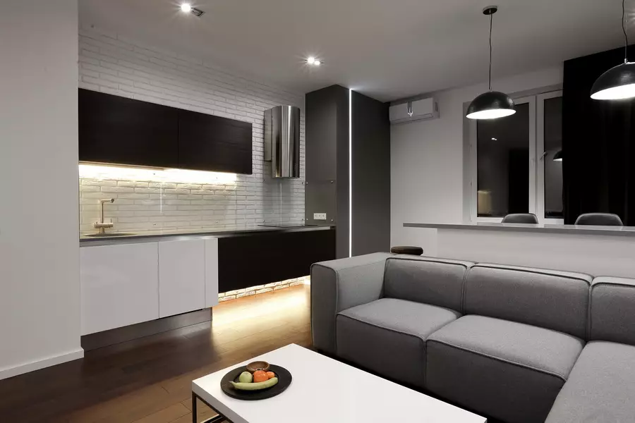 Design kitchen soggiorno 20 metri quadrati. M (75 foto): esempi di progetti con zonizzazione, opzioni interne, sfumature Pianificazione di un soggiorno combinato di cucina con un divano 9508_56