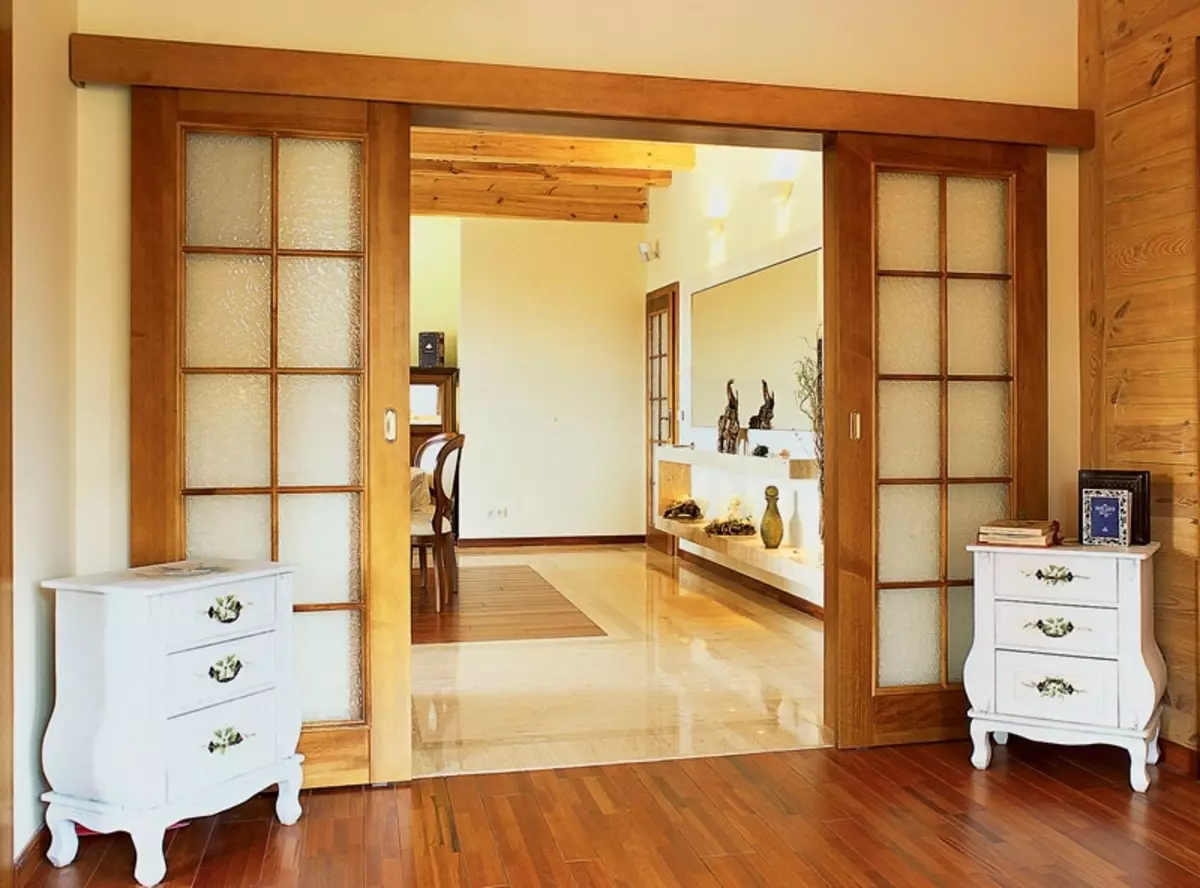 Раздвижные межкомнатные двери между кухней и гостиной фото