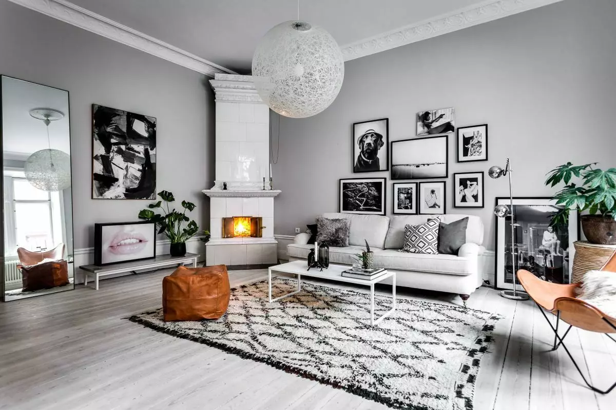 Sala de estar en estilo escandinavo (58 fotos): deseño de interiores do pequeno salón e grandes salas no apartamento e casa de campo, estreitas salas de estar brancas e outras opcións 9658_3