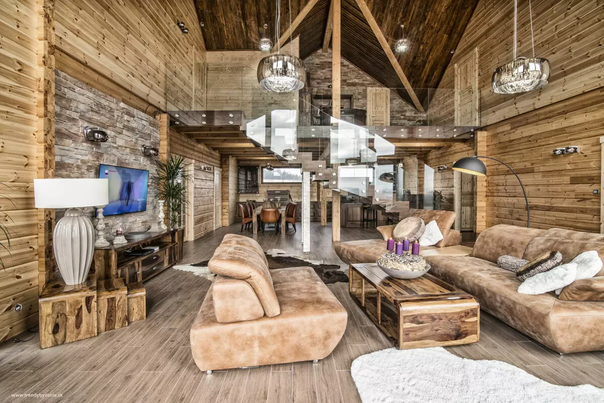 Sala de estar en una casa de madera (69 fotos): Opciones de diseño de interiores para la sala de estar del país. ¿Cómo organizar una sala en el país justo y con buen gusto? 9700_9