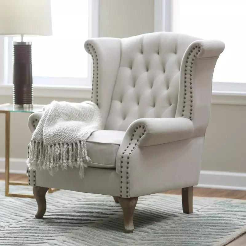 Dzīvojamā istabas krēsls (67 fotogrāfijas): moderns stilīgs mazs dizaina krēsls ar augstu muguru zālē un skaistiem maziem vērpšanas krēsliem, citiem interjera modeļiem 9709_2