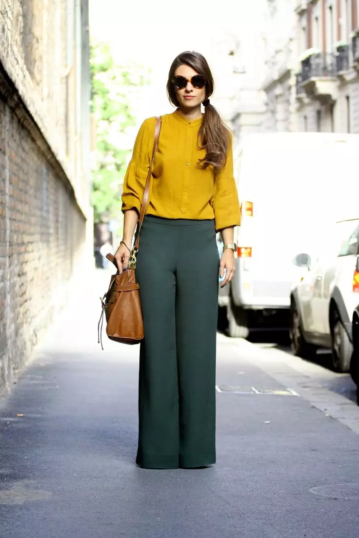 Široke ženske hlače 2021 (82 fotografij): Kaj nositi, za ženske s širokimi boki, z visokim pasom 971_72