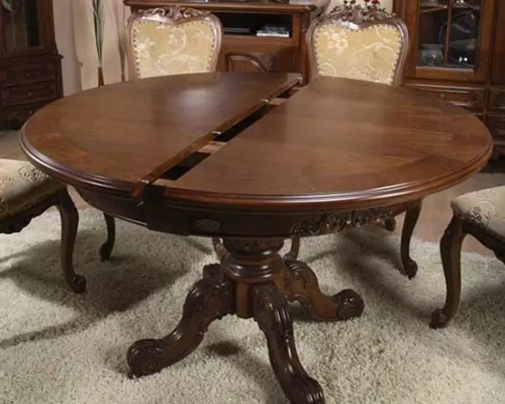 Produljivi stol za dnevni boravak: Savjeti za odabir ovalne i okrugle velike stolom za blagovanje. Pregled lijep, moderan tabele ruske proizvodnje. Zanimljivi primjeri 9732_25
