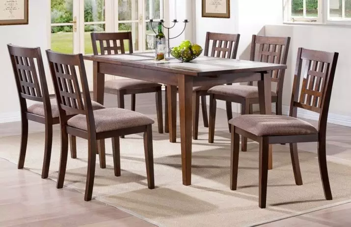 Produljivi stol za dnevni boravak: Savjeti za odabir ovalne i okrugle velike stolom za blagovanje. Pregled lijep, moderan tabele ruske proizvodnje. Zanimljivi primjeri 9732_26