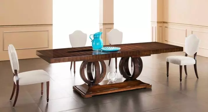 Mesa deslizante para a sala de estar: Dicas para escolher uma grande mesa de jantar oval e redonda. Revisão de mesas bonitas e modernas da produção russa. Exemplos interessantes 9732_48