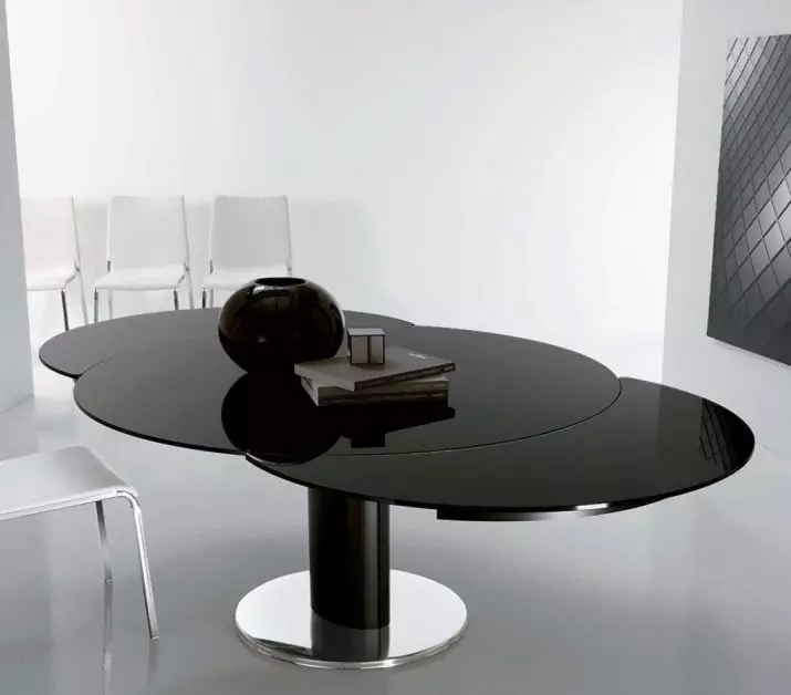 Mesa deslizante para a sala de estar: Dicas para escolher uma grande mesa de jantar oval e redonda. Revisão de mesas bonitas e modernas da produção russa. Exemplos interessantes 9732_49