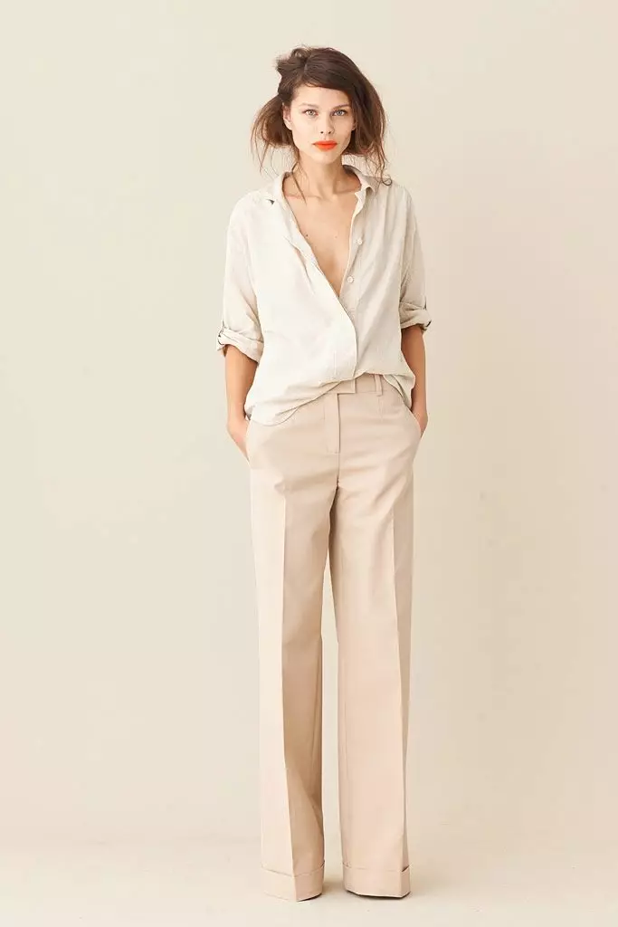 Штани кльош 2021 (124 фото): жіночі розкльошені моделі від стегна, з чим носити і як вибрати стильні штани 982_57