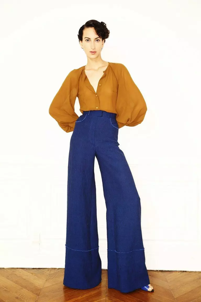 Штани кльош 2021 (124 фото): жіночі розкльошені моделі від стегна, з чим носити і як вибрати стильні штани 982_78