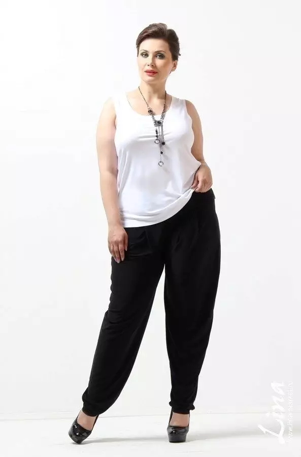 Хлаче панталоне Схаровари (48 фотографија): Шта да се носи и како да изаберете праве женске панталоне 983_27
