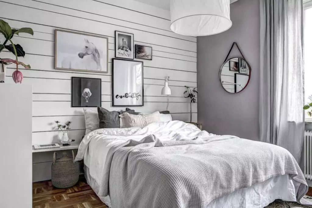 Спальня в сірих тонах (89 фото): шпалери на стінах в дизайні інтер'єру, спальня сіро-білого, синьо-сірого і світло-сірого відтінків. З якими квітами поєднується сірий? 9880_41